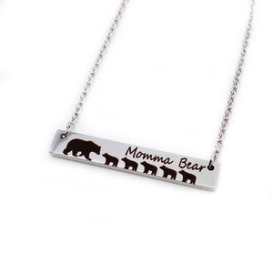 silver engraved bar necklace with 5 bear cubs and a mom bear. engraved with "momma Bear" and attached to a silver stainless steel cable chain