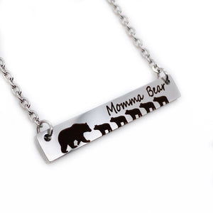 silver engraved bar necklace with 5 bear cubs and a mom bear. engraved with "momma Bear" and attached to a silver stainless steel cable chain left side view