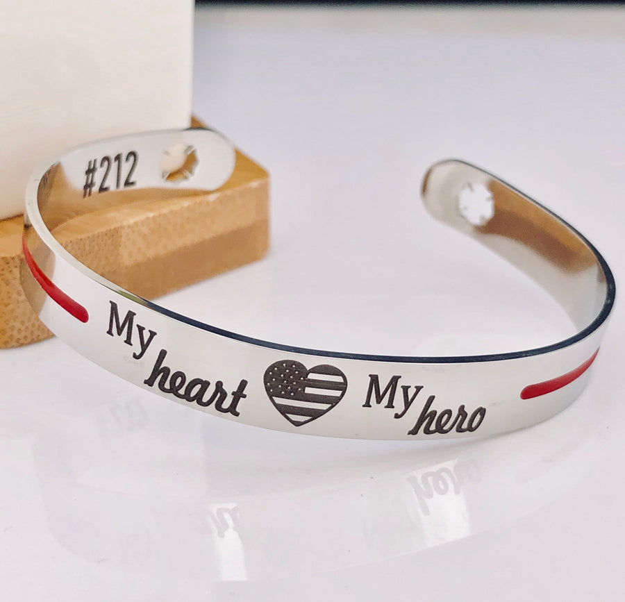 Silver stainless steel cuff bracelet thin red line with the engraving my heart my hero with an american flag heart and maltese fireman cross cutout with house number