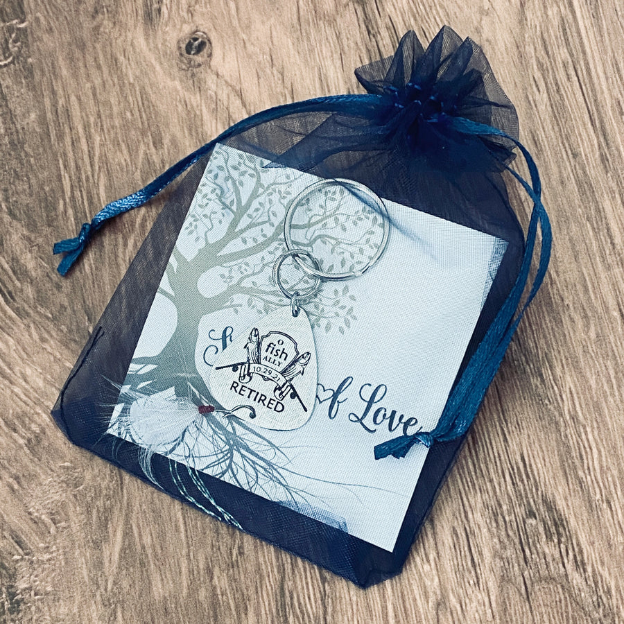 lure packaged in a blue organza gift bag from stamps of love
