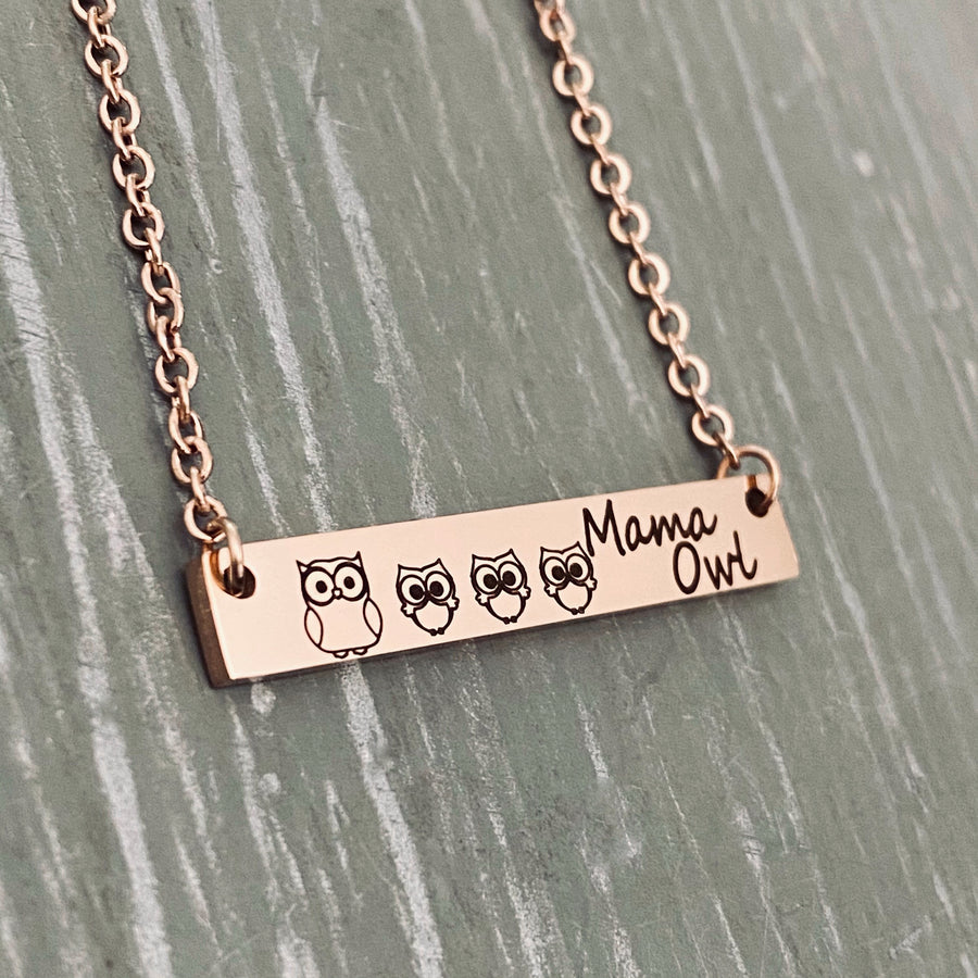 Mama Owl and 3 owlets engraved on a rose gold bar necklace.