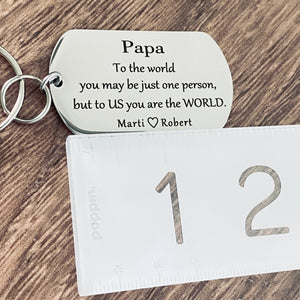 papa keychain by ruler to show size 2"