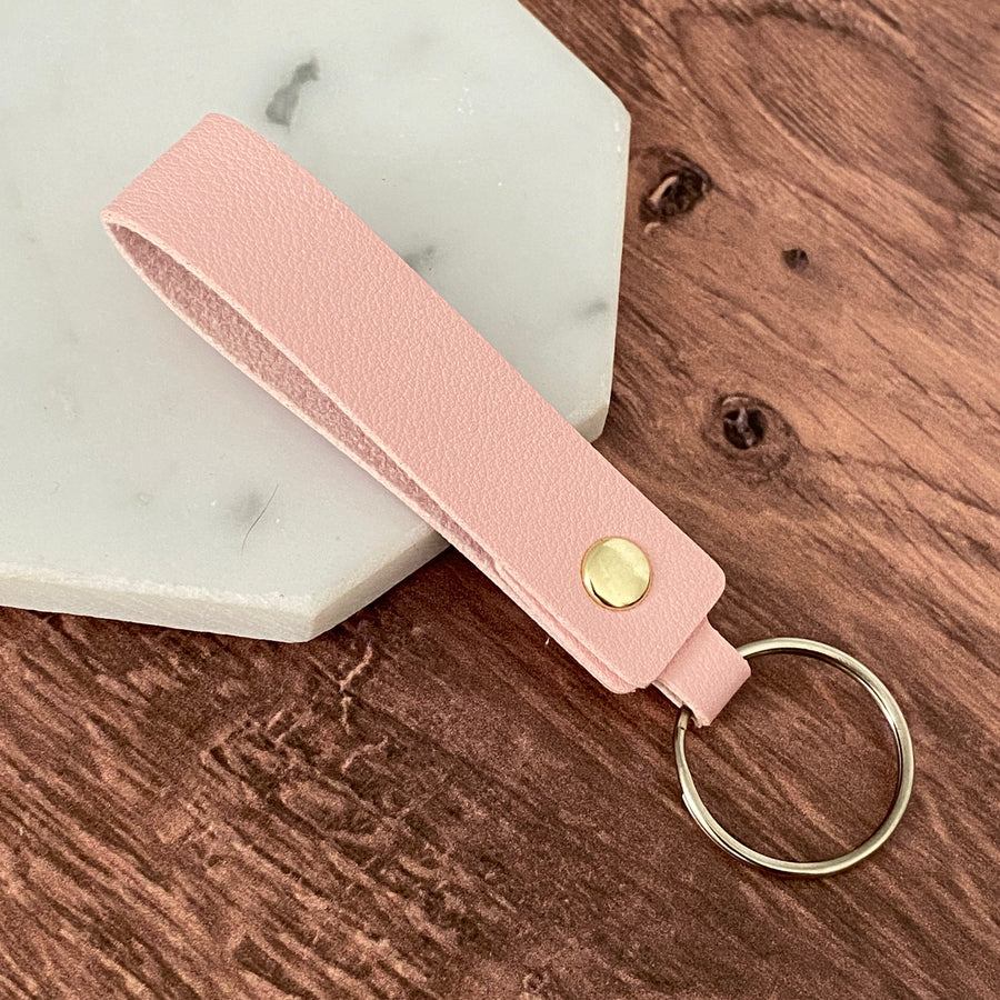 Pink leather strap keychain options.