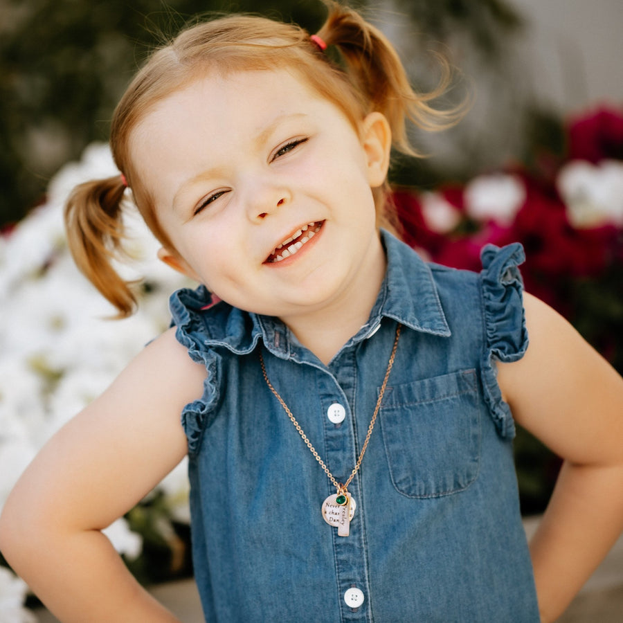 rose gold little girl wearing the dance necklace