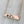 Rose gold sloth horizontal bar necklace with 1 mom sloth and 1 baby sloth with the phrase "mama sloth"
