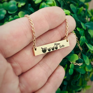 Yellow Gold Horizontal bar Necklace engraved with a mom sloth and 3 baby sloths along with "Mom Sloth"