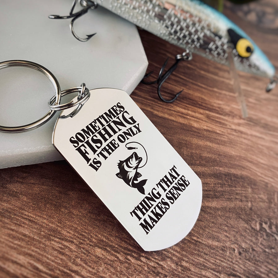 keychain with "Sometimes fishing is the only thing that makes sense." with a bass fishing catching a line with a lure
