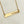 Yellow Gold stainless steel horizontal  bar necklace engraved with "Mrs. Poppy" and an apple charm. attached to a stainless steel cable chain