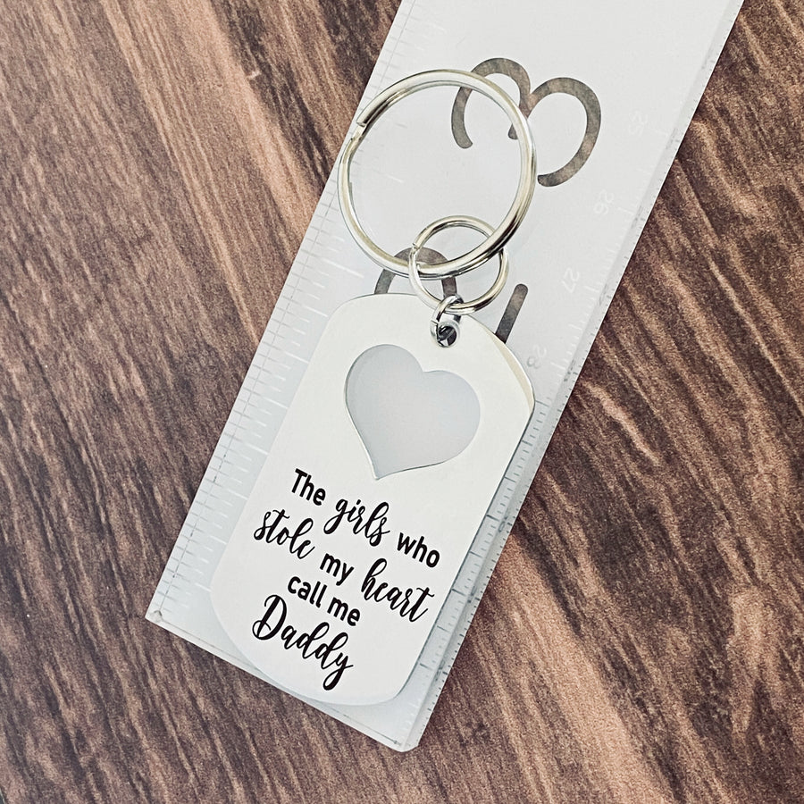 dog tag keychain on ruler to show 2" in length
