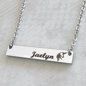 Silver stainless steel bar necklace engraved with personalized name jaelyn and unicorn image attached to a steel cable chain with lobster clasp
