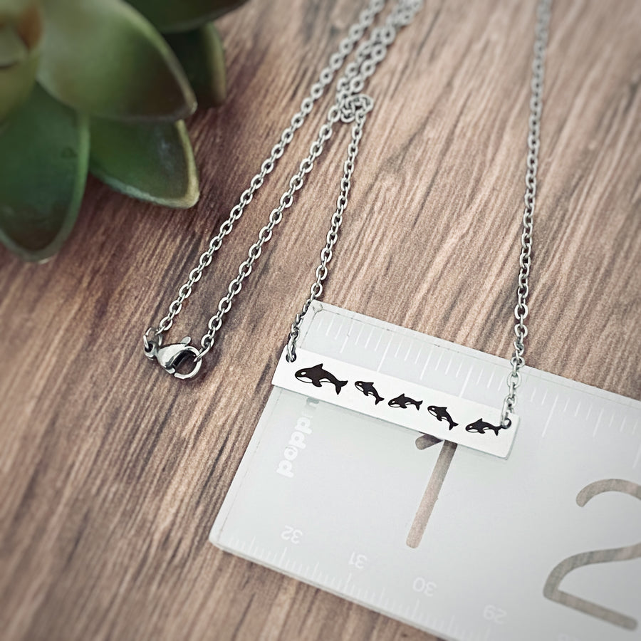 necklace on ruler to show measurement of 1.25"