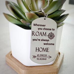 engraved dog tag with the verbiage wherever you choose to roam you're always welcome home. with a compass, arrow, and home longitude and longititude
