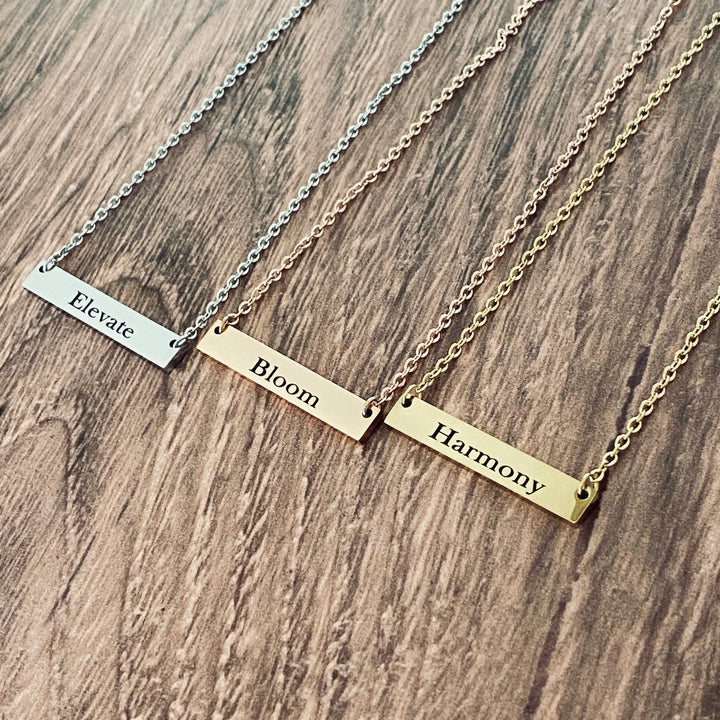engraved 2022 Word of the year bar necklaces in silver, rose gold, yellow gold Elevate, Bloom, Harmony