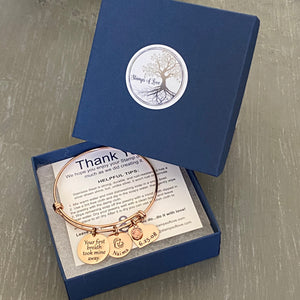 bracelet in blue jewelry gift box with thank you card