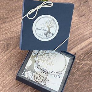 recovery anniversary bracelet in stamps of love blue gift box